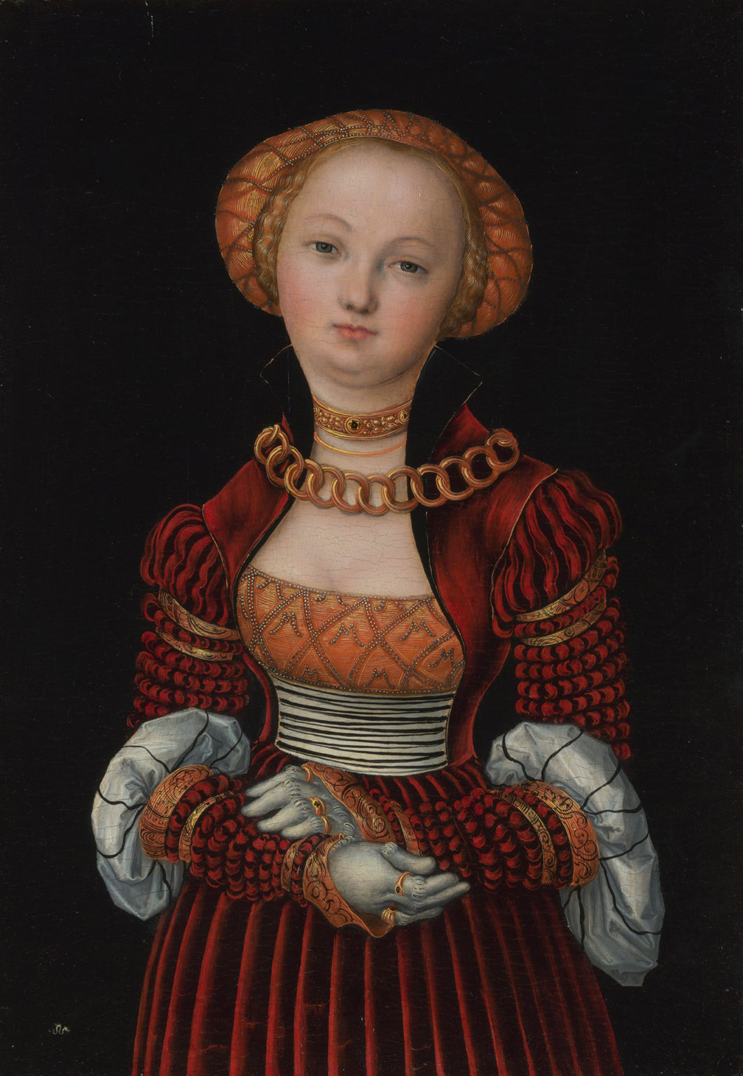 Portrait d'une femme peinte par Lucas Cranch l'Ancien. Elle est richement vêtue. Elle croise les bras.